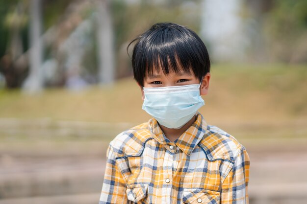 Boy wearing a mask to prevent dust and viruses