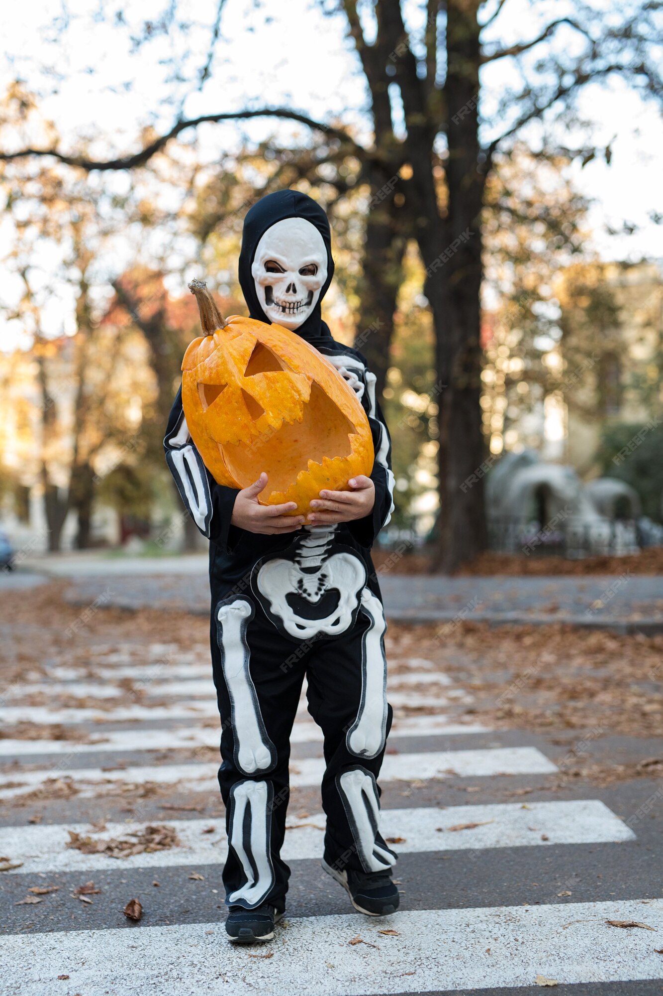 Premium Photo  A boy in a skeleton costume for halloween