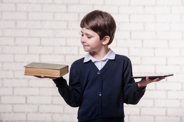 Boy with a book on a white background