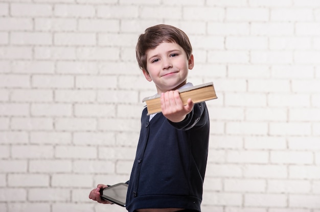 Boy with a book on a white background