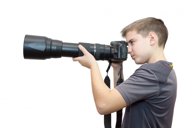 Ragazzo con una macchina fotografica