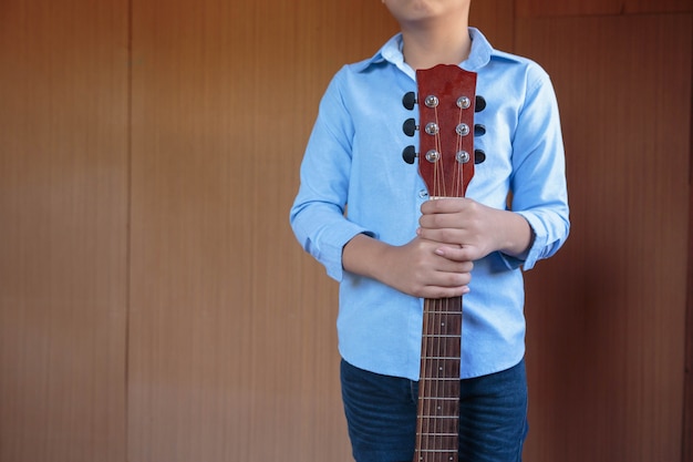 Boy with classic guitar