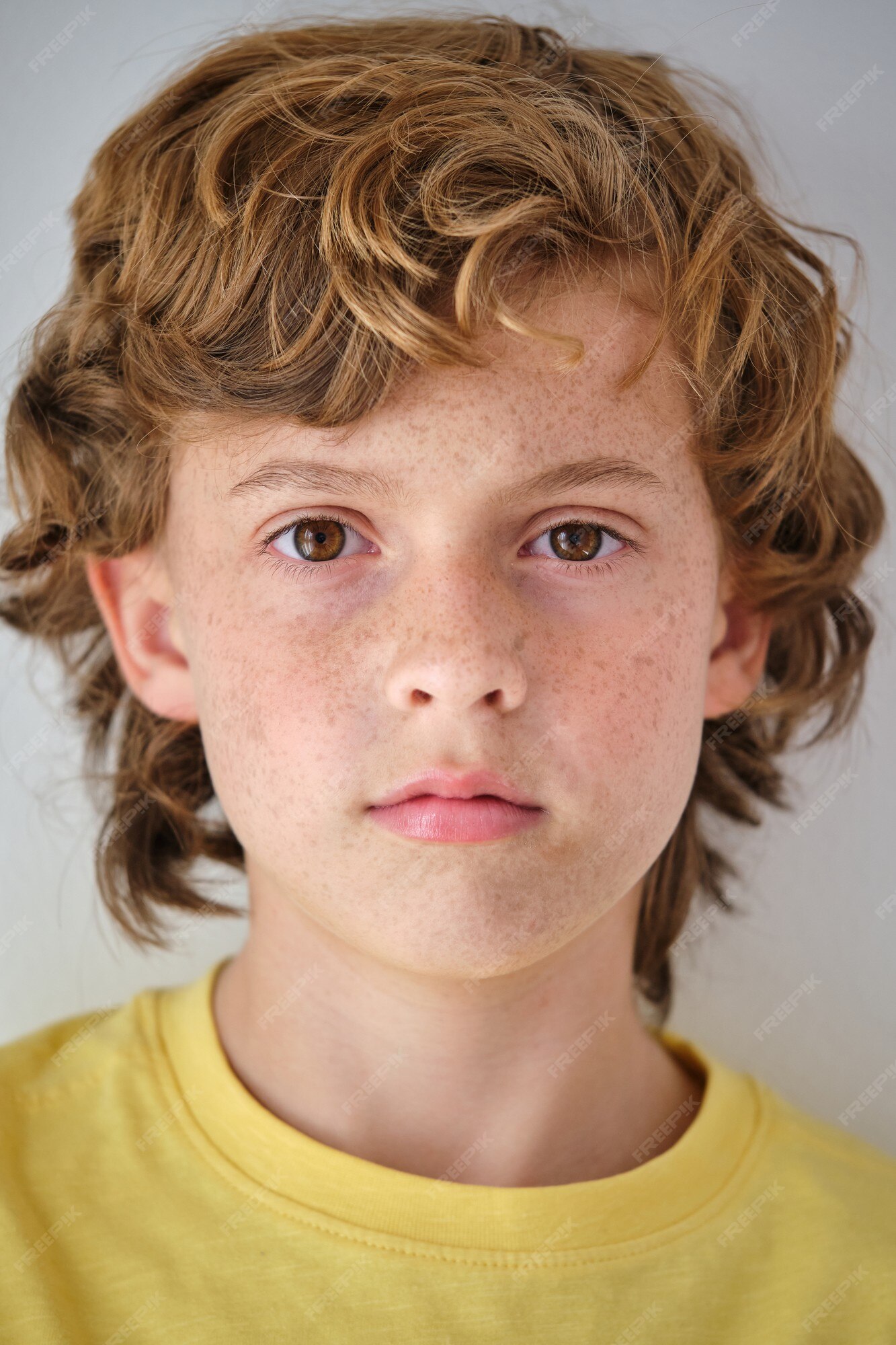 Premium Photo | Boy with freckles on face skin and brown hair Premium Photo | Boy with freckles on face skin and brown hair