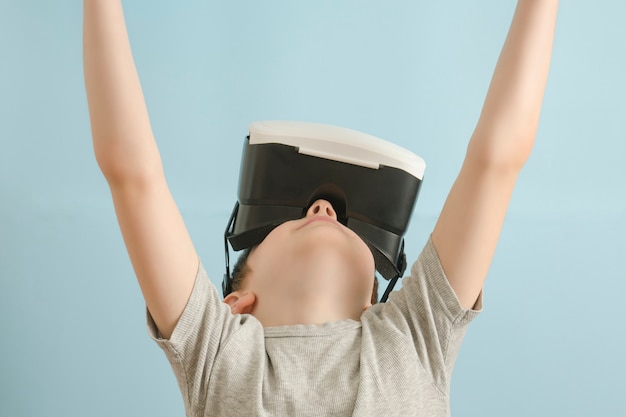 Boy with glasses of virtual reality.