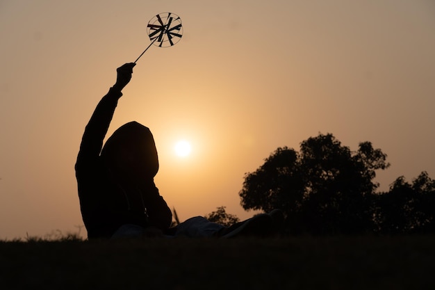 A boy with handmade toy in morning with son