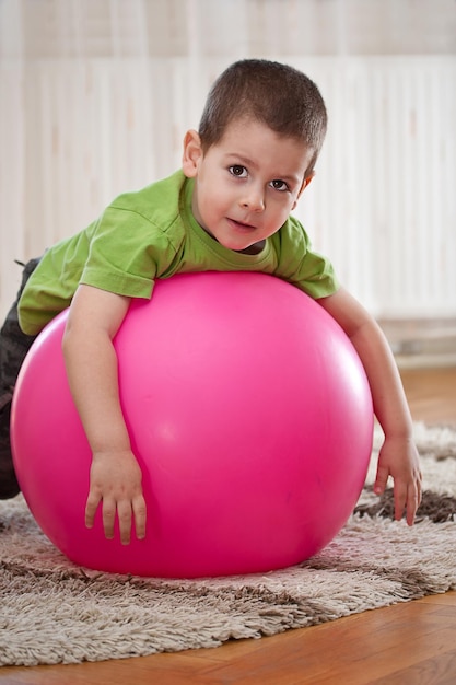 Boy with large ball