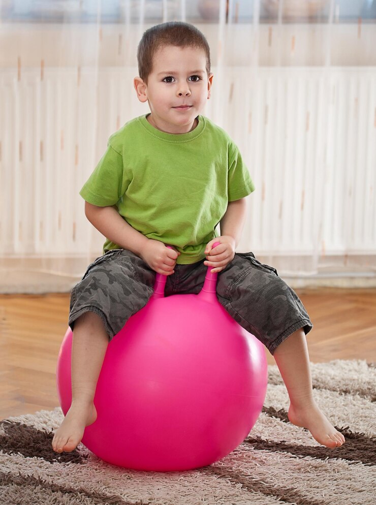 Boy with large ball