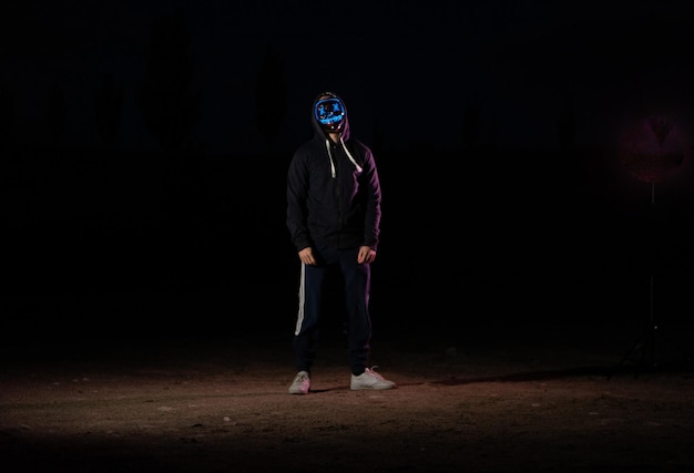 boy with lights mask from the purge