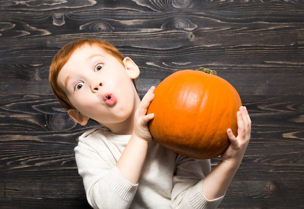 boy with a pumpkin
