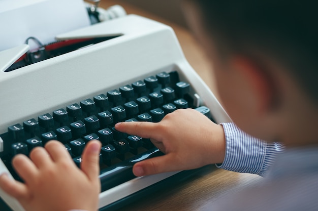 Boy with typewriter