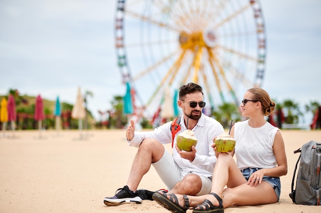 Boyfriend and girlfriend Resting on Beach