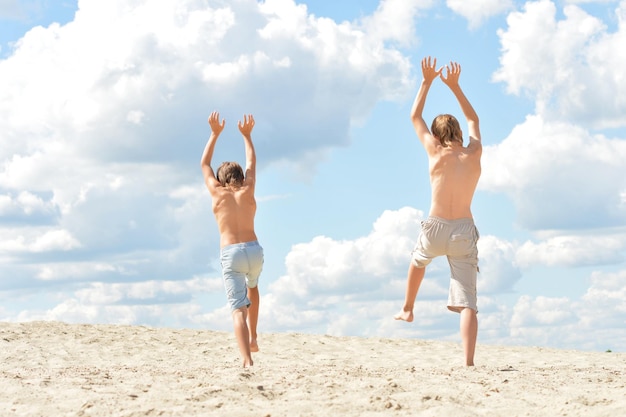 Boys on a beach on summer day