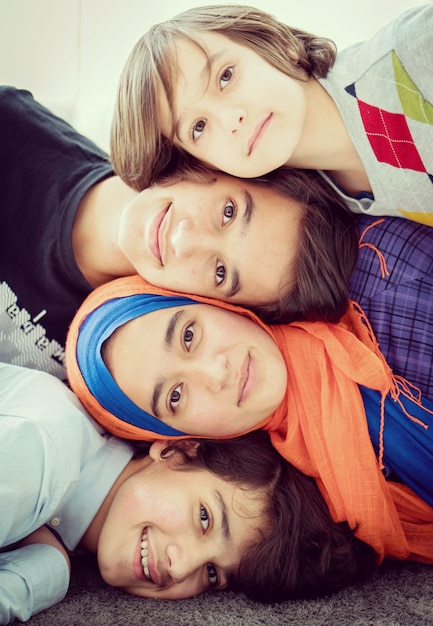 Photo boys and girl together portrait in row