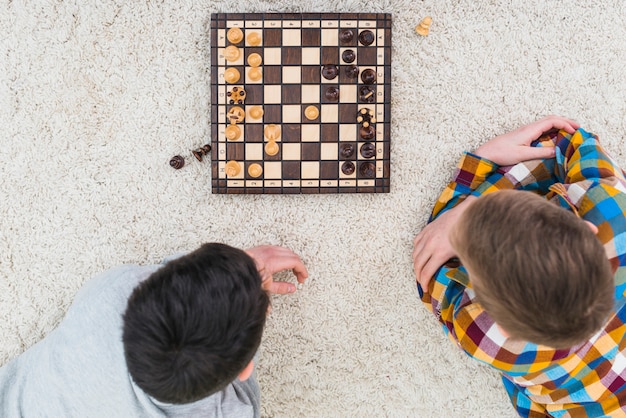 Photo boys playing chess