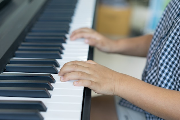 The Boys playing piano, Learning Piano