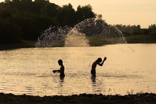 Boys playing water