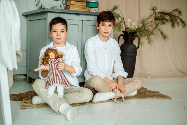 Boys posing with toys