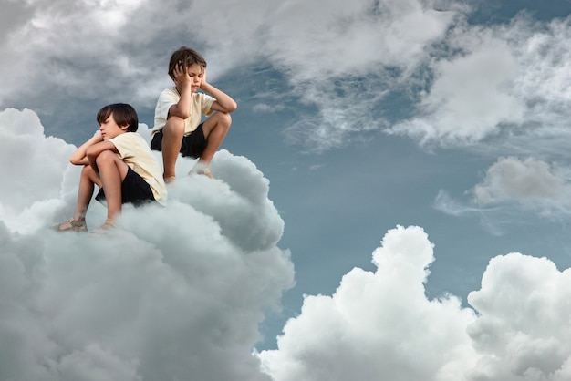 Photo boys thinking on clouds full shot