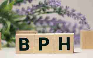 Photo bph benign prostatic hyperplasia acronym on wooden background