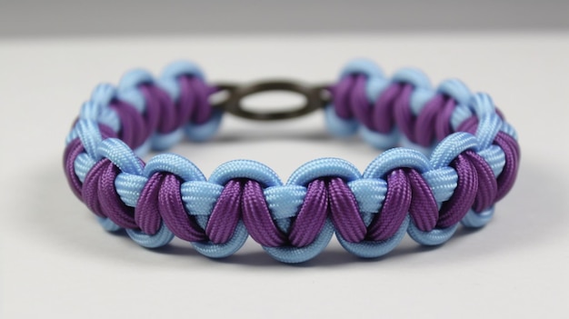 A bracelet made with purple and blue braided braided bands.