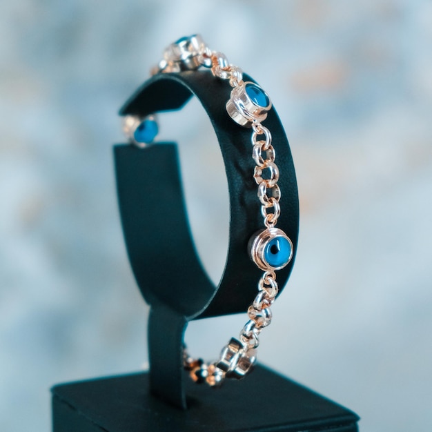 A bracelet with a blue sapphire and diamond on it.