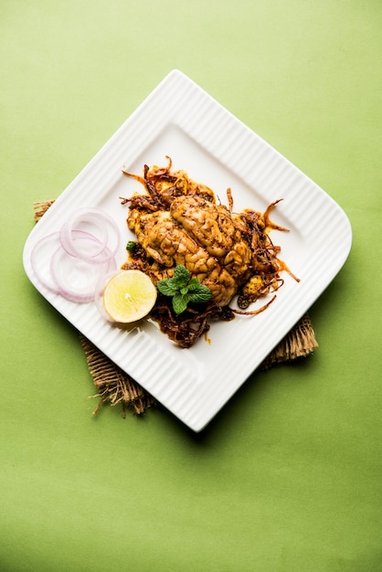 Brain or Bheja Fry of goat, sheep or lamb is a popular Indian or pakistani dish cooked on Bakra Eid(Eid-ul-zuha). served in karahi, pan or plate. selective focus