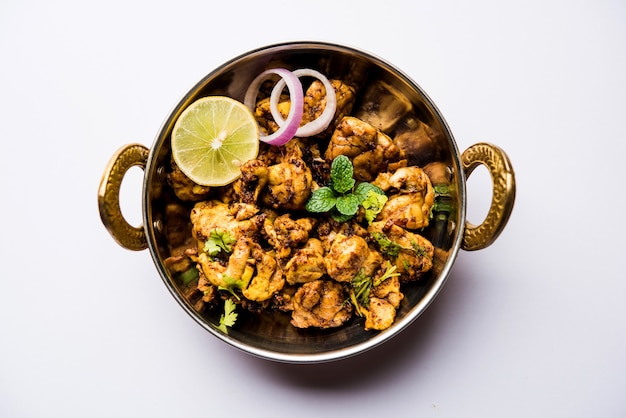 Brain or Bheja Fry of goat, sheep or lamb is a popular Indian or pakistani dish cooked on Bakra Eid(Eid-ul-zuha). served in karahi, pan or plate. selective focus