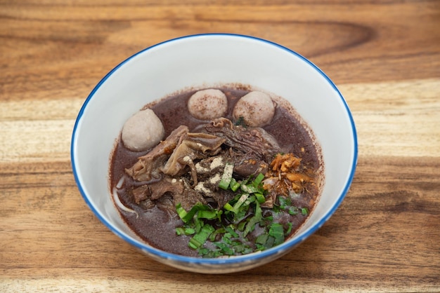 Braised beef clear noodle with meat ball soup stew