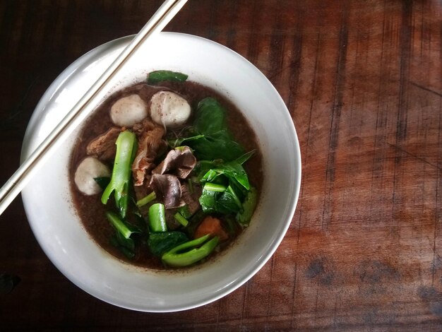 Braised beef noodles in a cup in the top view