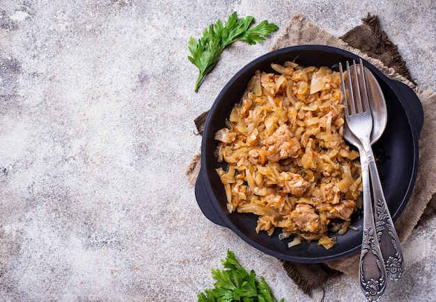 Photo braised cabbage with a meat