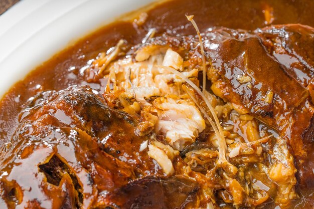 Braised crucian carp on a simple background