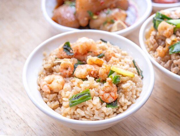 Braised shrimp over rice - Taiwan famous traditional street food. Soy-stewed prawn on cooked rice.