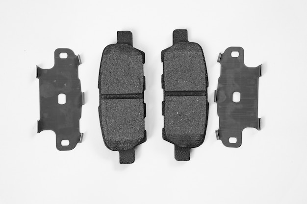 brake pad against a white background. part of braking system, main working component.