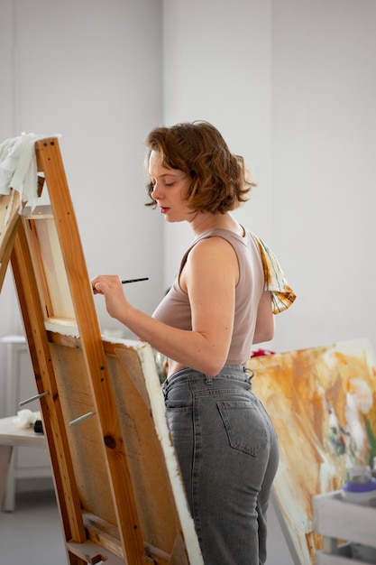 Braless woman working indoor