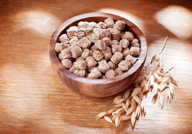 Bran fiber on a wooden background