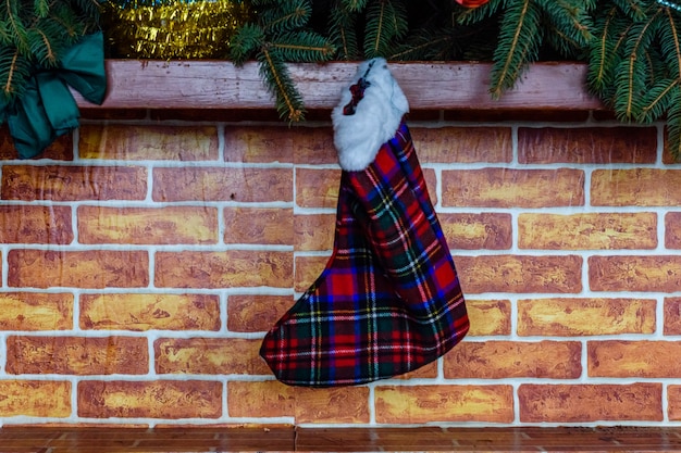 Branches of the fir tree and christmas stocking