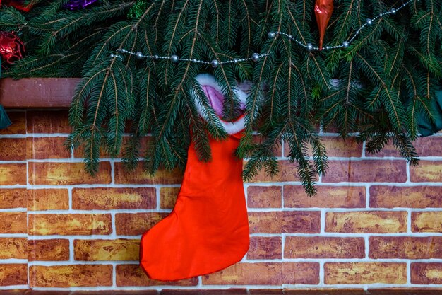 Branches of the fir tree and christmas stocking