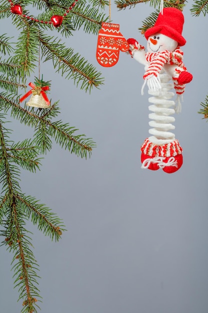 Branches of fir tree with Christmas ornament