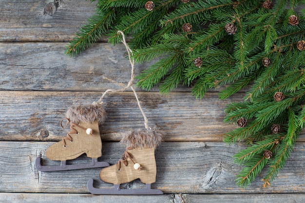 Branches of spruce, cones and skates