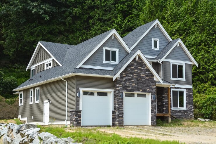 Brand new luxury residential house on green trees background