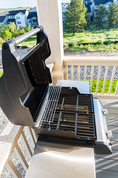 Brand new twoburner grill stationed on balcony