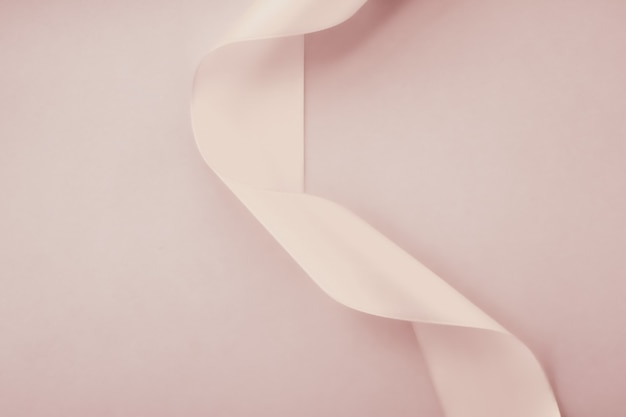 Branding holidays and luxe brands concept  abstract curly silk ribbon on pastel background exclusive...