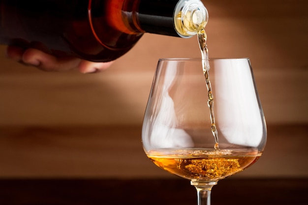 Brandy glass on wooden table