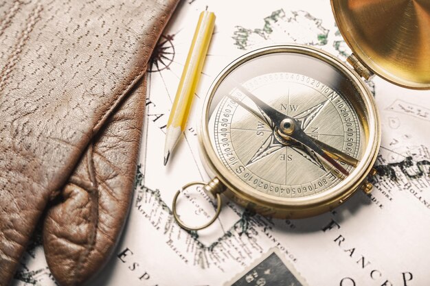 Photo brass antique compass  on background