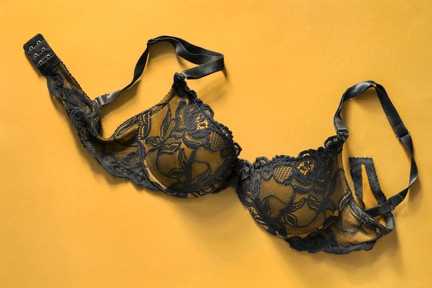 Brassiere on yellow background