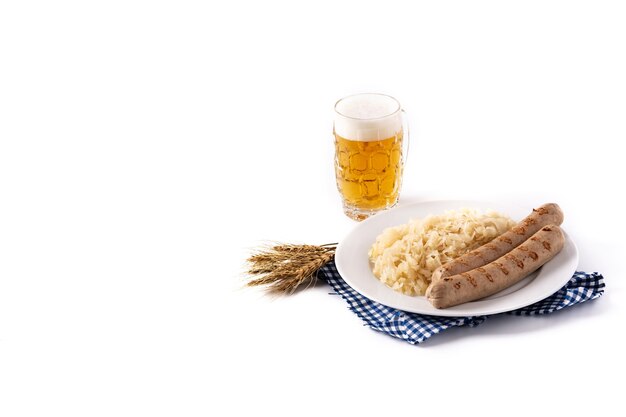 Bratwurst sausage ,sauerkraut, pretzels and beer isolated on white background