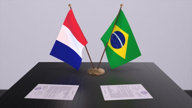 外交会議室のテーブルに置かれたブラジルとフランスの国旗 政治協定合意