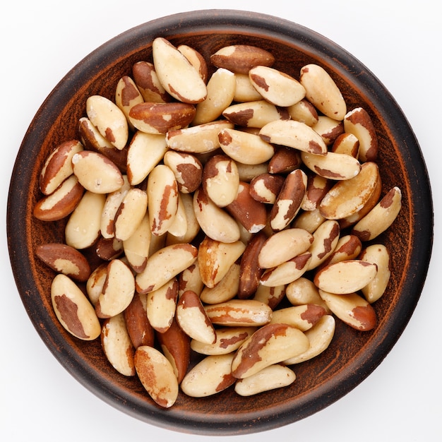 Brazil nut in a plate isolated