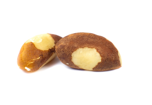 Brazil nuts on white background. Close up photo.