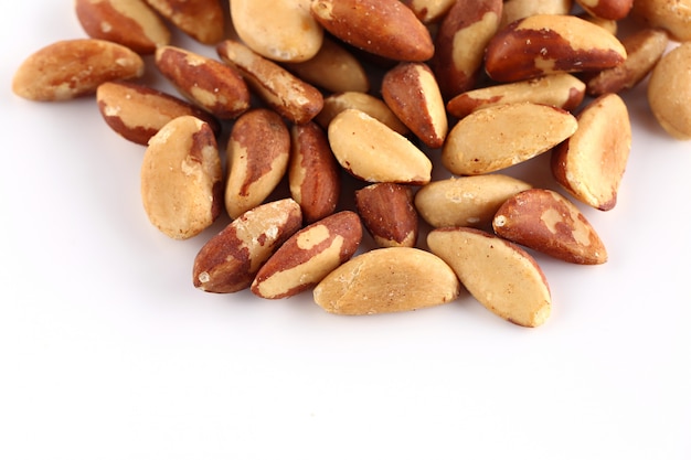 Brazil nuts on a white surface